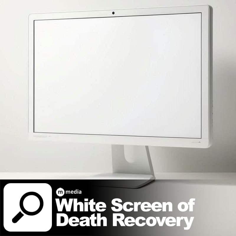 Blank white computer monitor on a white background representing white screen of death recovery