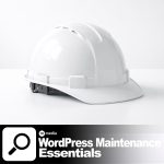 White construction helmet on a white background representing WordPress maintenance essentials