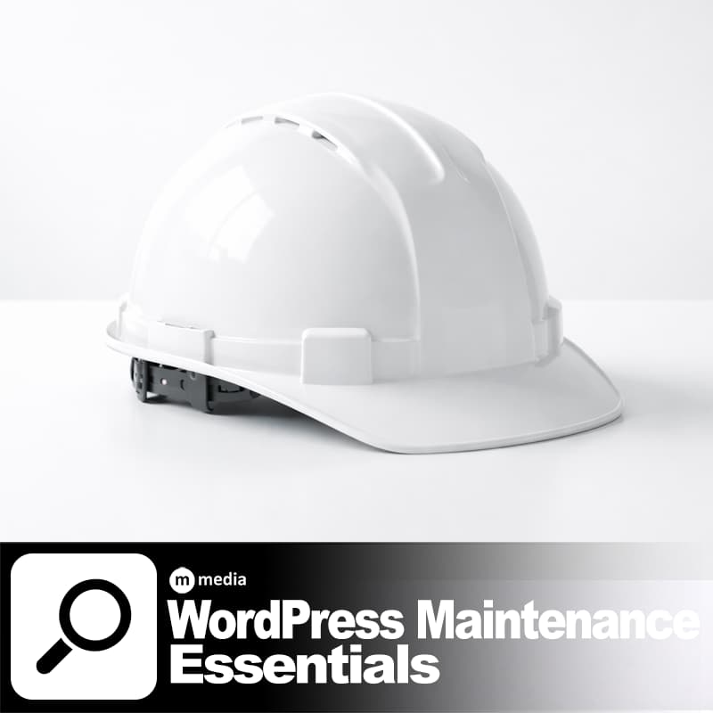 White construction helmet on a white background representing WordPress maintenance essentials